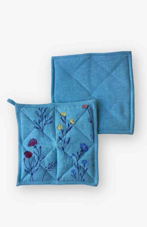 square cotton potholder with screen printed floral design fair trade nepal
