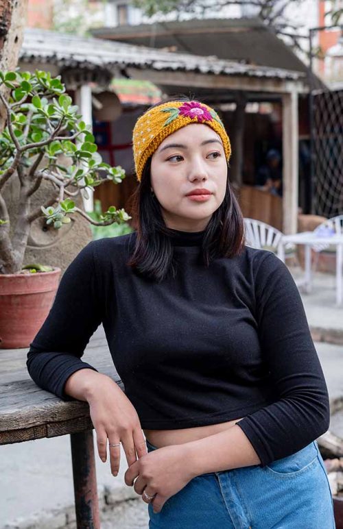 wool knit headband with flower embroidery from nepal jewel tones gorgeous feminine bow shape